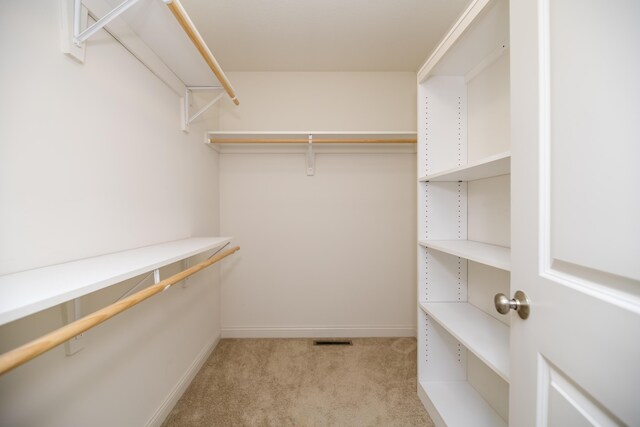 4405 Ferndale Dr, Columbia, MO 65202 - spacious closet with light colored carpet and visible vents