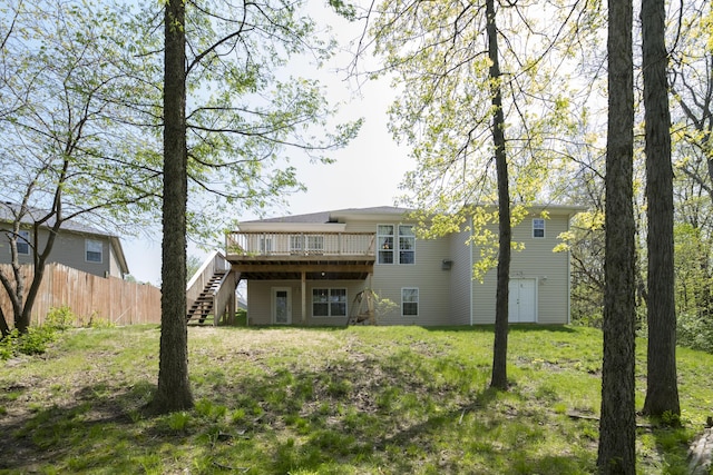 4405 Ferndale Dr, Columbia, MO 65202 - rear view of house with stairs, a wooden deck, and fence