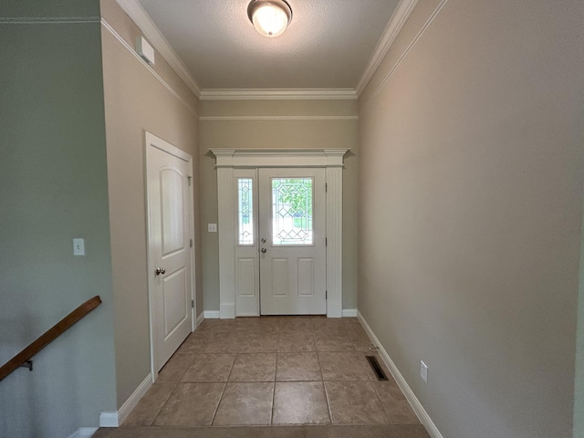 4405 Ferndale Dr, Columbia, MO 65202 - doorway featuring crown molding, baseboards, and visible vents