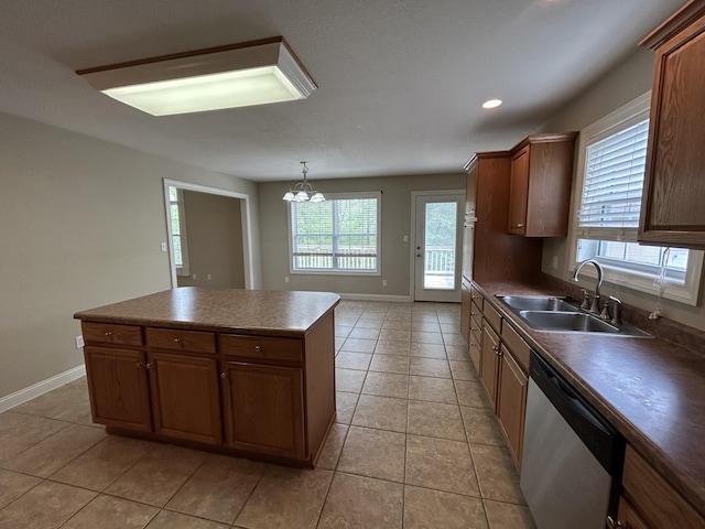 4405 Ferndale Dr, Columbia, MO 65202 - kitchen featuring a sink, light tile patterned floors, baseboards, and dishwasher