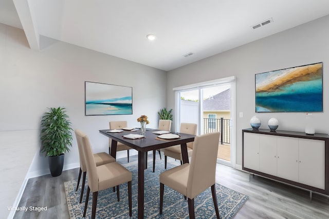 dining space featuring baseboards, recessed lighting, light wood finished floors, and visible vents