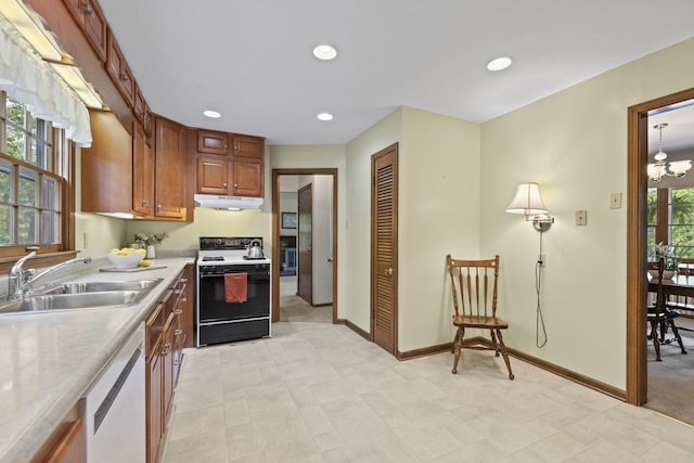 1509 W Rollins Rd, Columbia, MO 65203 - kitchen featuring a sink, brown cabinetry, dishwasher, under cabinet range hood, and range with electric cooktop