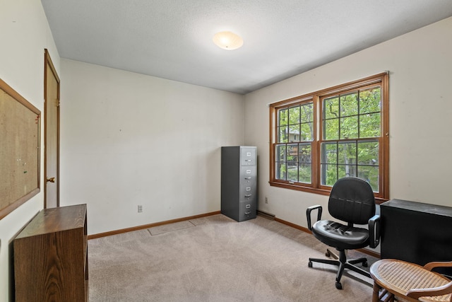 1509 W Rollins Rd, Columbia, MO 65203 - office area featuring light colored carpet and baseboards