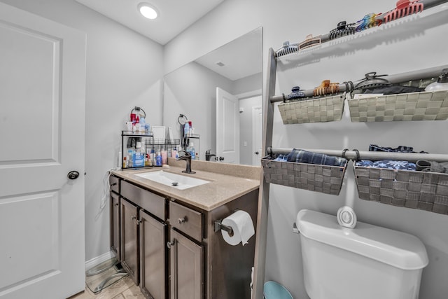 5803 Misty Springs Way, Columbia, MO 65202 - bathroom with vanity, marble finish floor, baseboards, and toilet