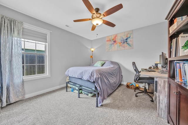 bedroom featuring baseboards, a ceiling fan, carpet, and visible vents