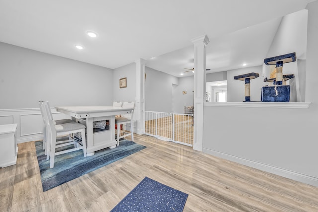 5803 Misty Springs Way, Columbia, MO 65202 - dining space with ornate columns, recessed lighting, a ceiling fan, and wood finished floors