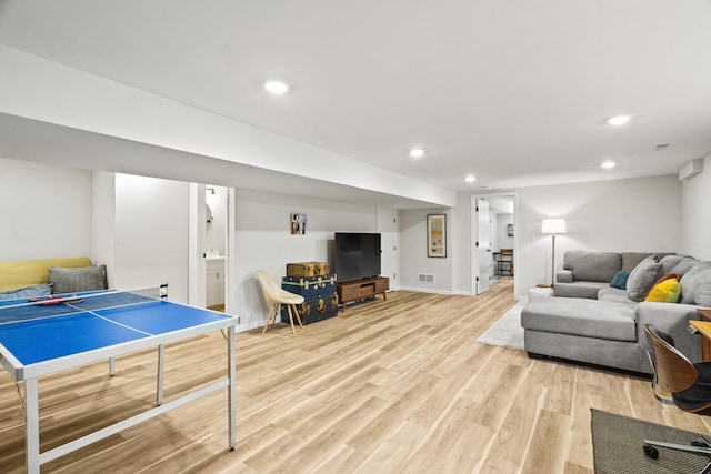 recreation room featuring recessed lighting, baseboards, visible vents, and light wood finished floors