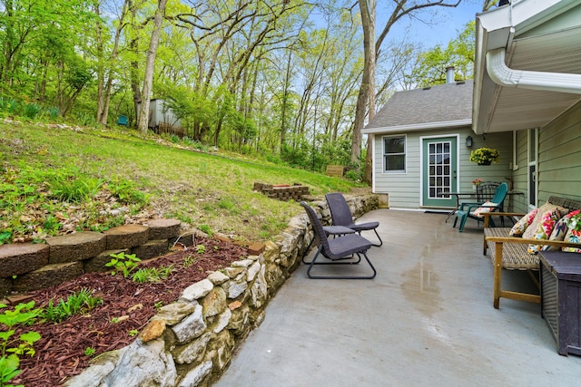 view of patio featuring a fire pit