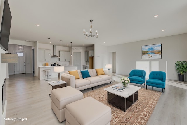 820 Angels Rest Way, Columbia, MO 65203 - living area with an inviting chandelier, recessed lighting, and light wood-style flooring