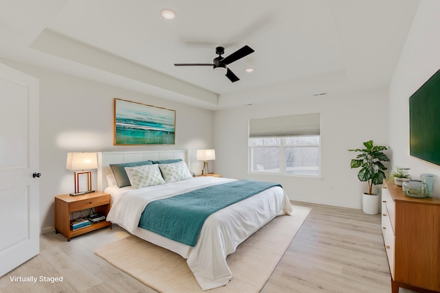 820 Angels Rest Way, Columbia, MO 65203 - bedroom featuring light wood-style floors, baseboards, a tray ceiling, and recessed lighting