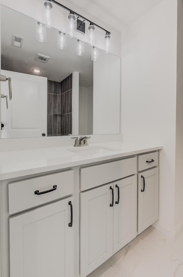 820 Angels Rest Way, Columbia, MO 65203 - bathroom with vanity, baseboards, marble finish floor, and visible vents