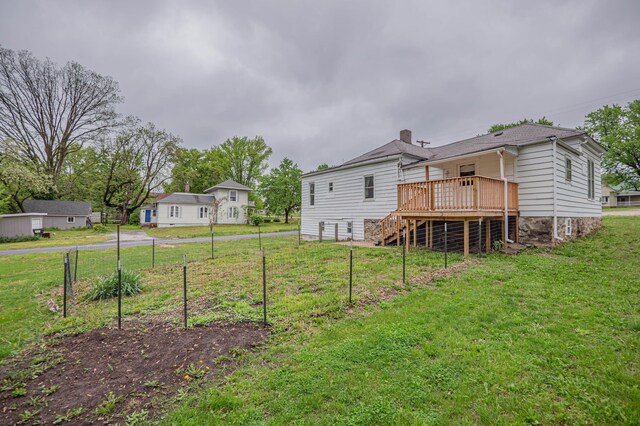 exterior space with stairway, fence, and a wooden deck