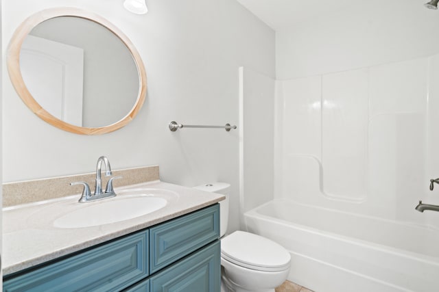 bathroom featuring toilet,  shower combination, and vanity
