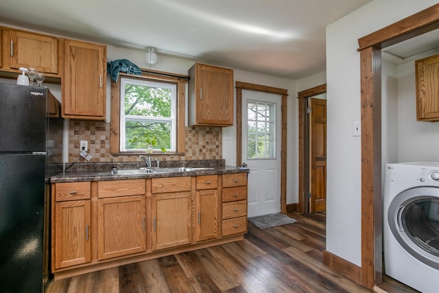 5435 N Creasy Springs Rd, Columbia, MO 65202 - kitchen featuring a sink, plenty of natural light, freestanding refrigerator, and washer / clothes dryer