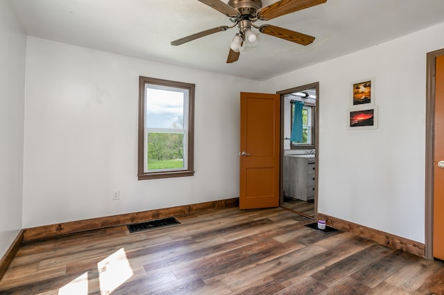 5435 N Creasy Springs Rd, Columbia, MO 65202 - spare room with baseboards, visible vents, and a healthy amount of sunlight