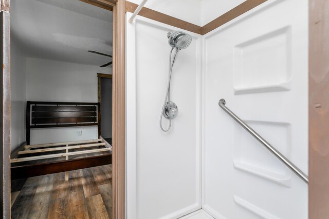 5435 N Creasy Springs Rd, Columbia, MO 65202 - bathroom with a shower and wood finished floors