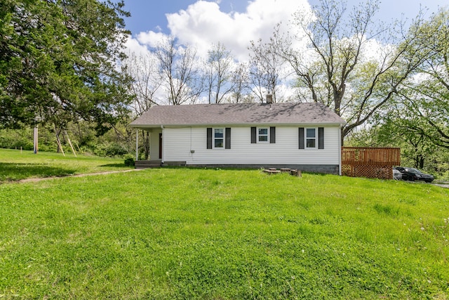 5435 N Creasy Springs Rd, Columbia, MO 65202 - view of front facade with a deck, a chimney, and a front yard