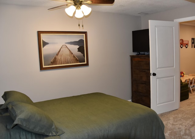 bedroom featuring carpet flooring and ceiling fan