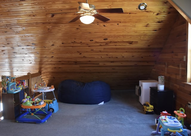 bonus room with carpet floors and a ceiling fan