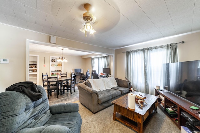 207 Lucky St, Fayette, MO 65248 - living area featuring a chandelier and crown molding