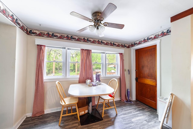 207 Lucky St, Fayette, MO 65248 - dining area featuring a wealth of natural light, baseboards, a ceiling fan, and wood finished floors