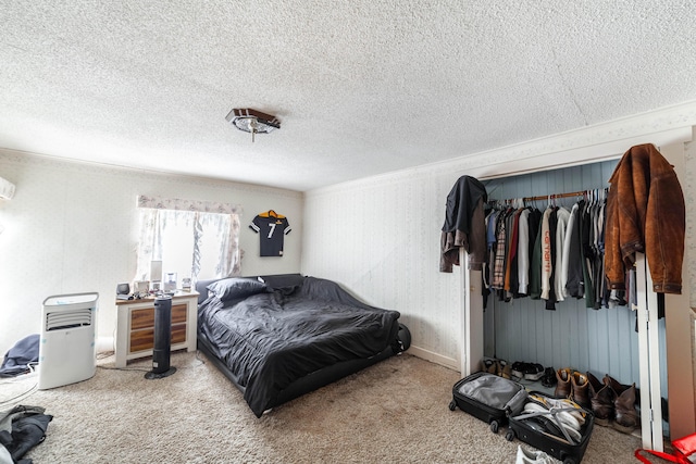 207 Lucky St, Fayette, MO 65248 - bedroom with a textured ceiling, ornamental molding, and carpet