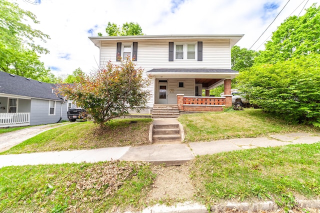 207 Lucky St, Fayette, MO 65248 - american foursquare style home featuring covered porch and a front yard