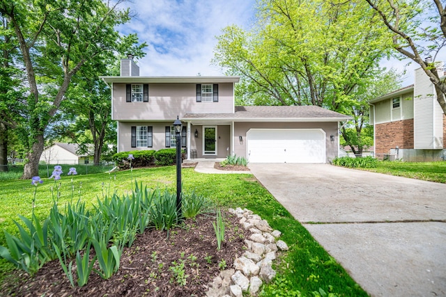traditional-style home with fence, an attached garage, driveway, a front lawn, and a chimney
