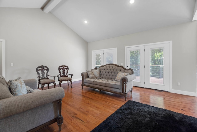 4520 County Road 1245, Moberly, MO 65270 - living area featuring beam ceiling, high vaulted ceiling, recessed lighting, baseboards, and wood finished floors