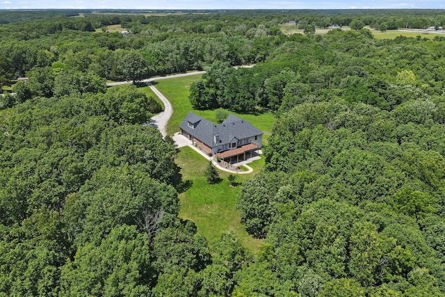 4520 County Road 1245, Moberly, MO 65270 - birds eye view of property with a wooded view