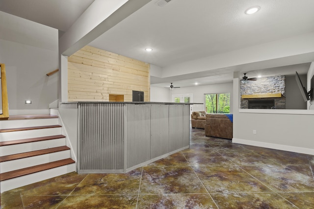 4520 County Road 1245, Moberly, MO 65270 - kitchen featuring recessed lighting, ceiling fan, open floor plan, and a fireplace