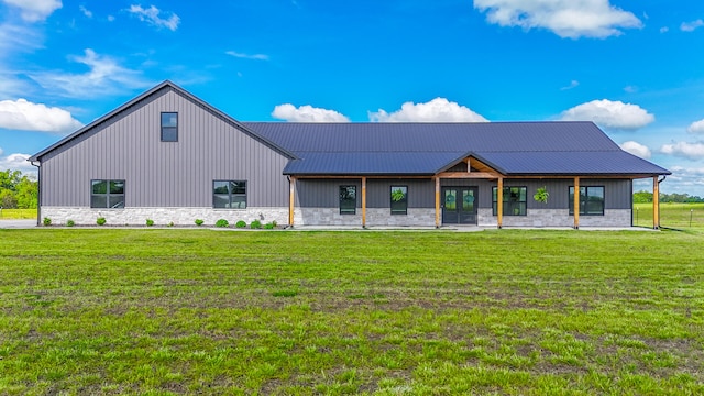 7495 N Rte Z, Columbia, MO 65202 - rear view of house featuring a yard, metal roof, french doors, and stone siding