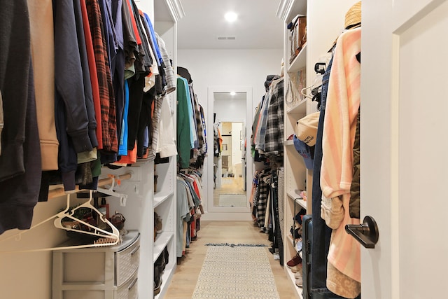 7495 N Rte Z, Columbia, MO 65202 - walk in closet with light wood-type flooring and visible vents