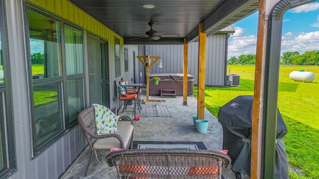 7495 N Rte Z, Columbia, MO 65202 - view of patio with a ceiling fan, cooling unit, area for grilling, and a hot tub