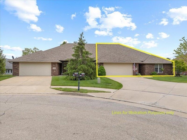 ranch-style house featuring a front yard, an attached garage, brick siding, and driveway