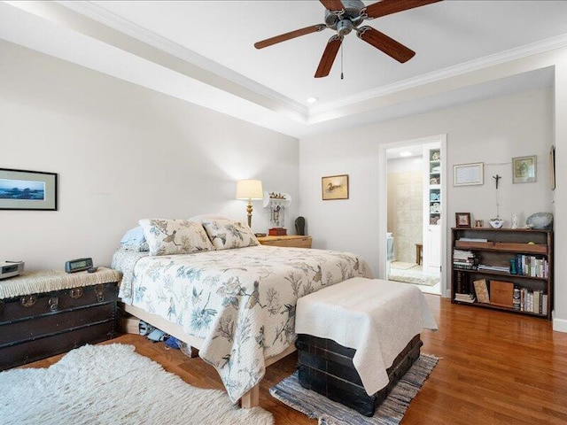 bedroom featuring a ceiling fan, ornamental molding, recessed lighting, and wood finished floors