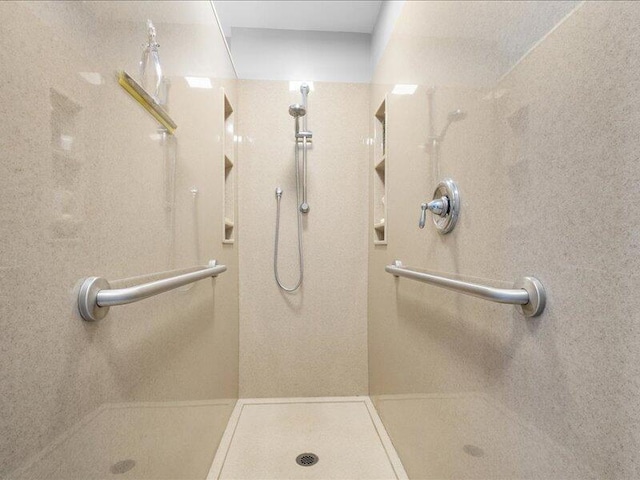 bathroom with a shower stall