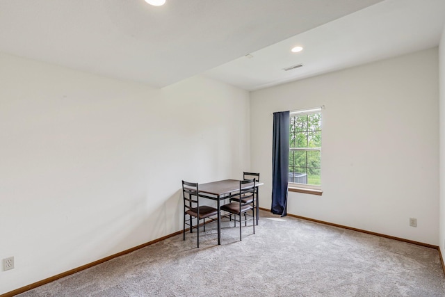 carpeted dining room featuring baseboards, recessed lighting, and visible vents