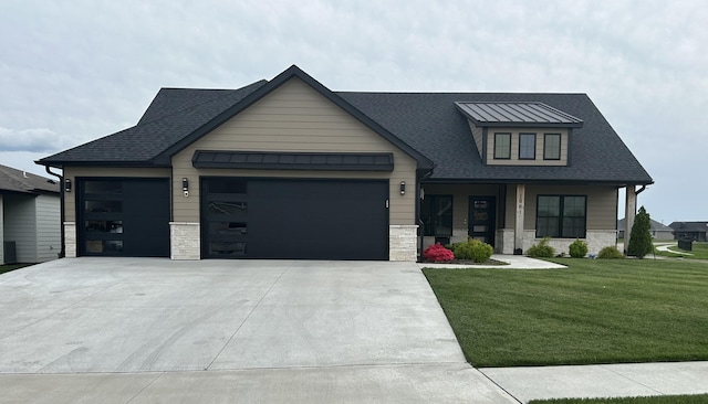 1001 Shore Acres Loop, Columbia, MO 65201 - view of front of property featuring a garage, concrete driveway, and stone siding