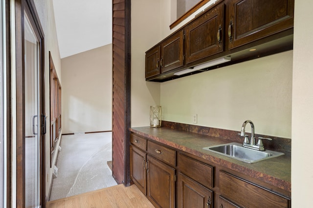 2036 Wendemere Ct, Jefferson City, MO 65109 - bar area featuring a sink and light carpet