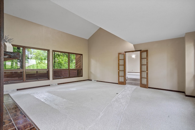 2036 Wendemere Ct, Jefferson City, MO 65109 - carpeted empty room featuring healthy amount of natural light, baseboards, and high vaulted ceiling