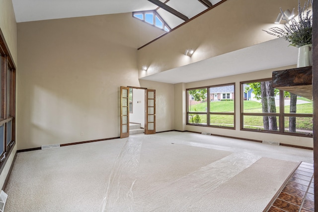 2036 Wendemere Ct, Jefferson City, MO 65109 - carpeted empty room featuring high vaulted ceiling and baseboards