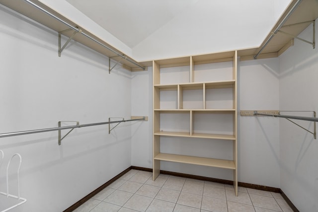 2036 Wendemere Ct, Jefferson City, MO 65109 - spacious closet with lofted ceiling and light tile patterned floors