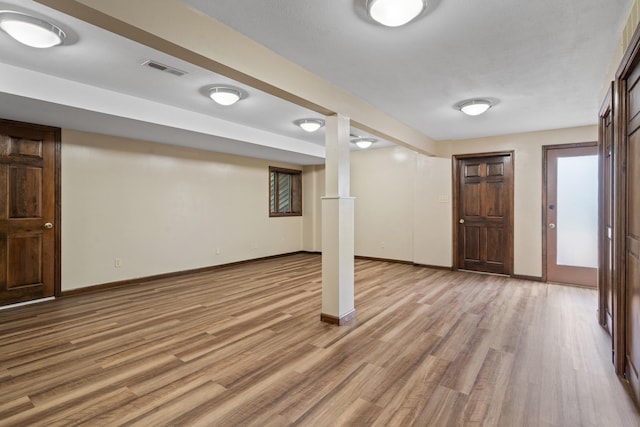 2036 Wendemere Ct, Jefferson City, MO 65109 - below grade area featuring light wood finished floors and baseboards