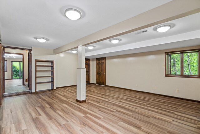 2036 Wendemere Ct, Jefferson City, MO 65109 - basement with baseboards, light wood-type flooring, and healthy amount of natural light