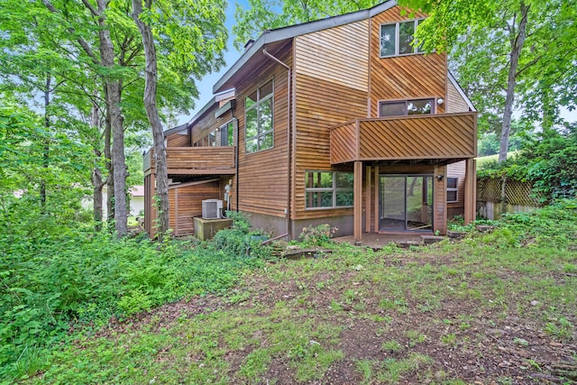 2036 Wendemere Ct, Jefferson City, MO 65109 - back of property featuring a balcony and central air condition unit
