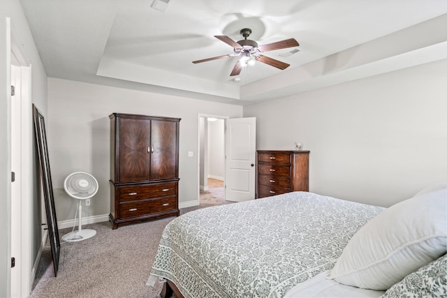 bedroom featuring carpet floors, baseboards, and ceiling fan