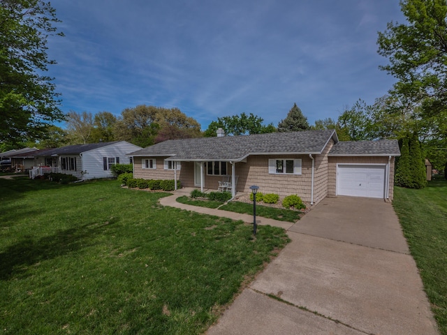 single story home with a porch, a garage, concrete driveway, and a front yard