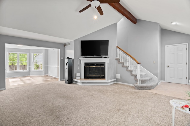 unfurnished living room featuring carpet floors, ceiling fan, a glass covered fireplace, recessed lighting, and stairway