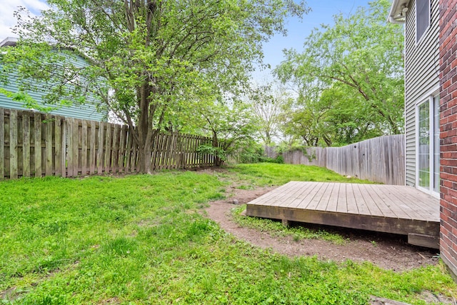 view of yard with a deck